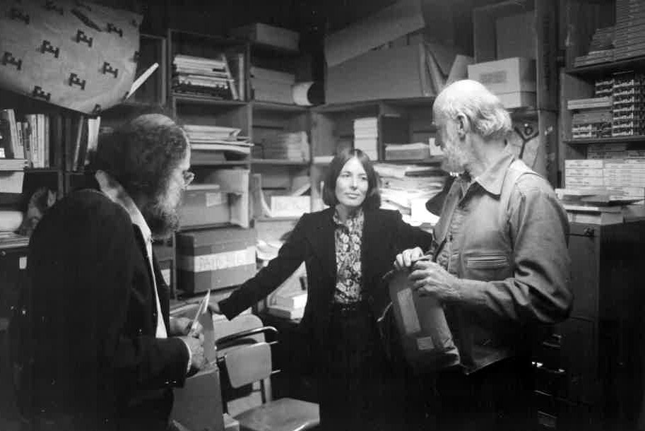 Allen Ginsberg, editor Nancy Peters and Lawrencer Ferlinghetti chat inside the publishing offices